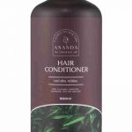 Ananda Organic Hair Conditioner bottle with wooden pump, labeled as 'Natural Herbal' and designed with green herbal leaf imagery. 500ml volume indication