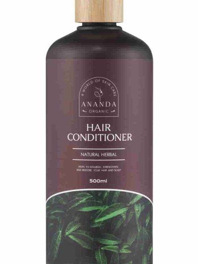 Ananda Organic Hair Conditioner bottle with wooden pump, labeled as 'Natural Herbal' and designed with green herbal leaf imagery. 500ml volume indication
